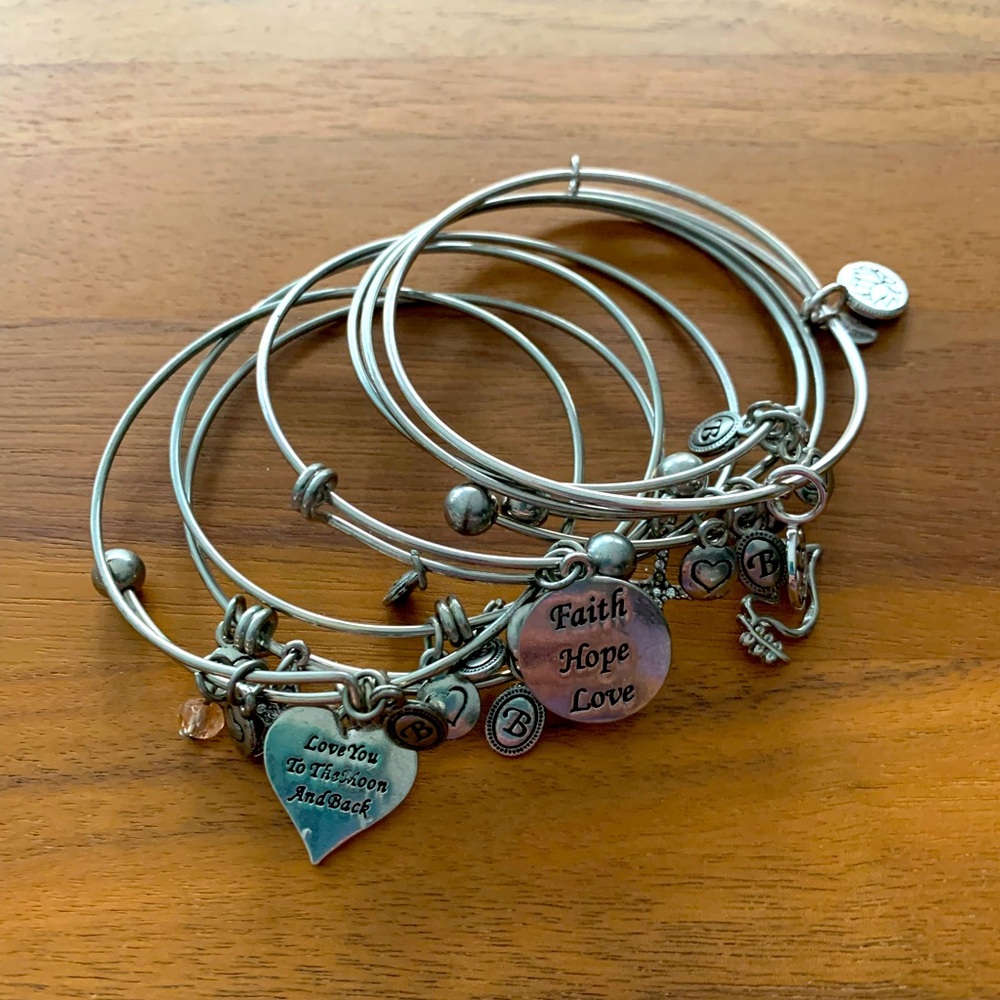 WindandFire 7 stackable silver metal charm bracelets. All different. EUC.